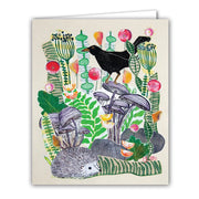 greeting card depicting art drawing of leaves plants mushrooms a crow and a hedgehog. no text